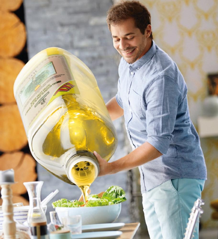 Guy pouring olive oil on the salad blank meme template