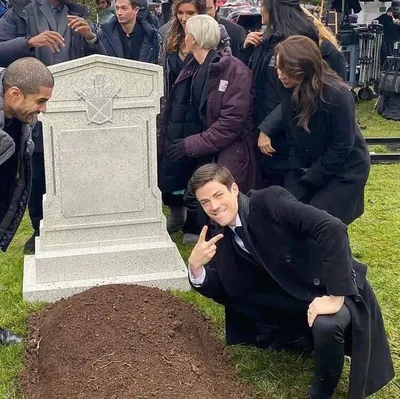 Guy posing in front of grave blank meme template